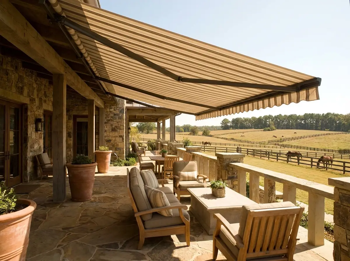 Wide covered stoep with a folding-arm awning extended over open paddock views on a Mooikloof equestrian estate
